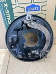 Dodge 2ND Gen Ram Driver Side 00-02 Rear Left Brake Backing Plate Drum. Fixed Price $245.00.