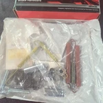 Drum Brake Adjusting Spring Kit Rear Motorcraft BRSK-7312-A. Fixed Price $12.00.